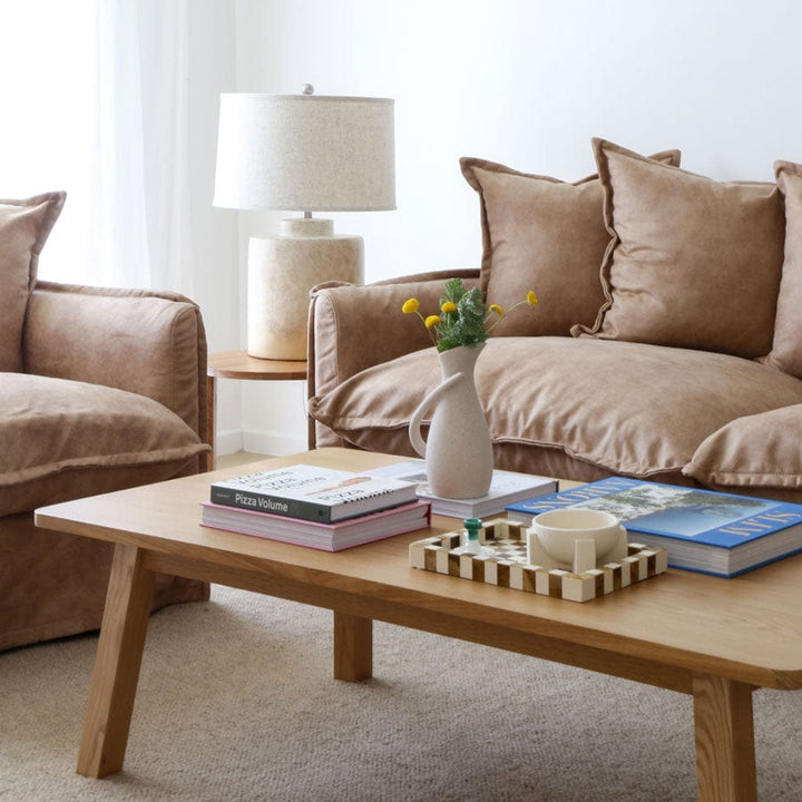 The Cloud 2 Seater Sofa with Fawn Leatherette Slipcover By Black Mango Interiors