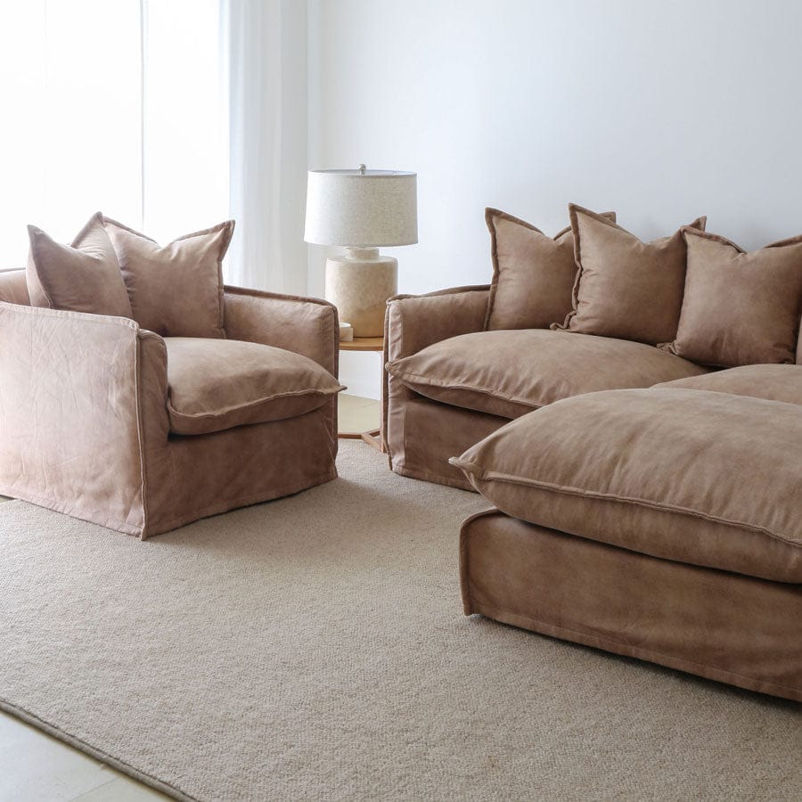 The Cloud 2 Seater Sofa with Fawn Leatherette Slipcover By Black Mango Interiors