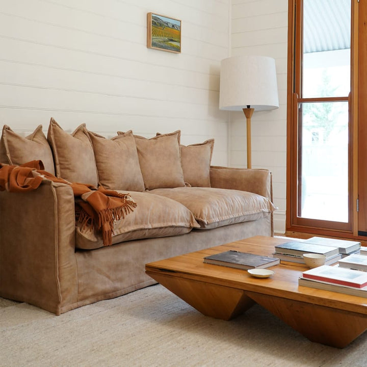 The Cloud 2 Seater Sofa with Fawn Leatherette Slipcover By Black Mango Interiors