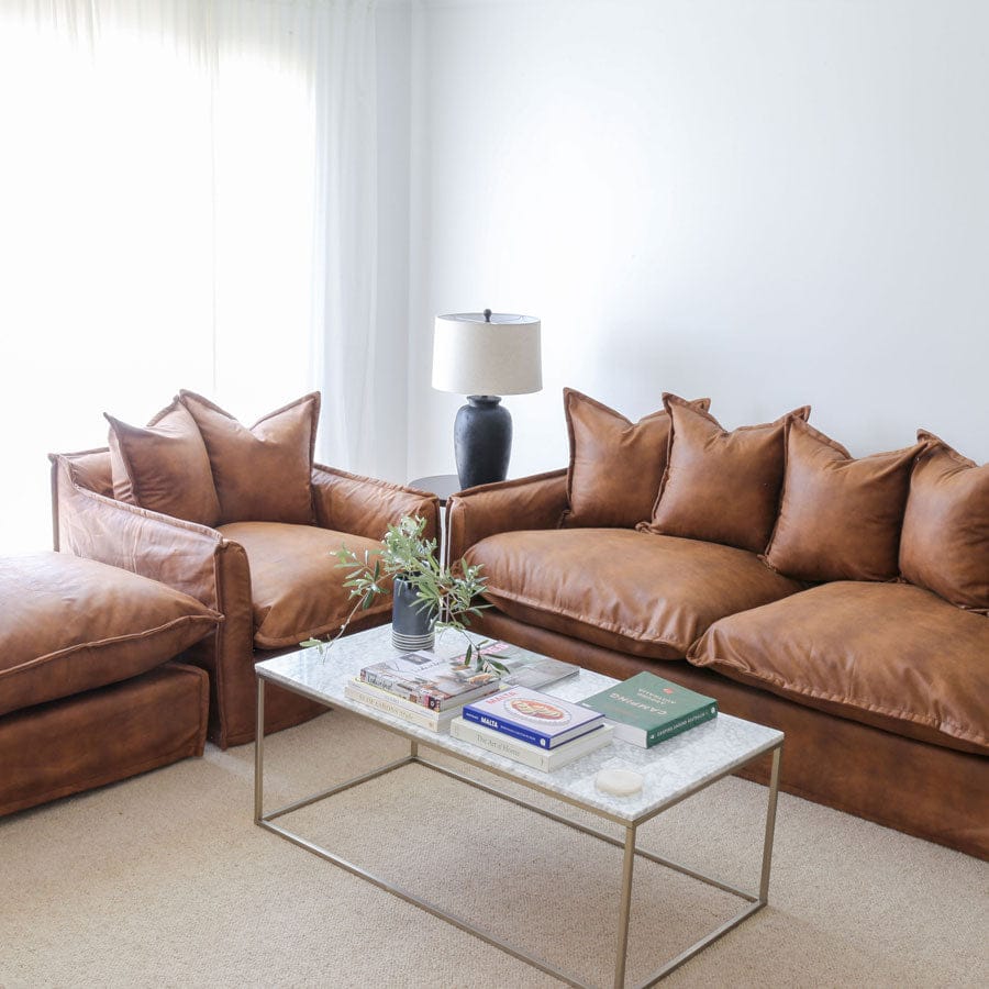 The Cloud 2 Seater Sofa with Tan Leatherette Slipcover By Black Mango Interiors