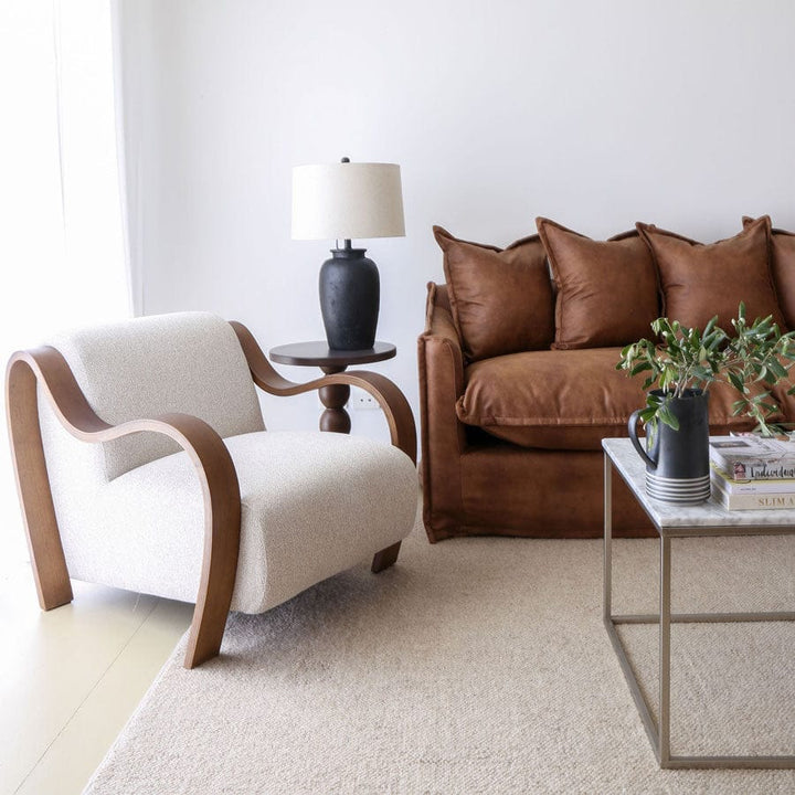 The Cloud 2 Seater Sofa with Tan Leatherette Slipcover By Black Mango Interiors
