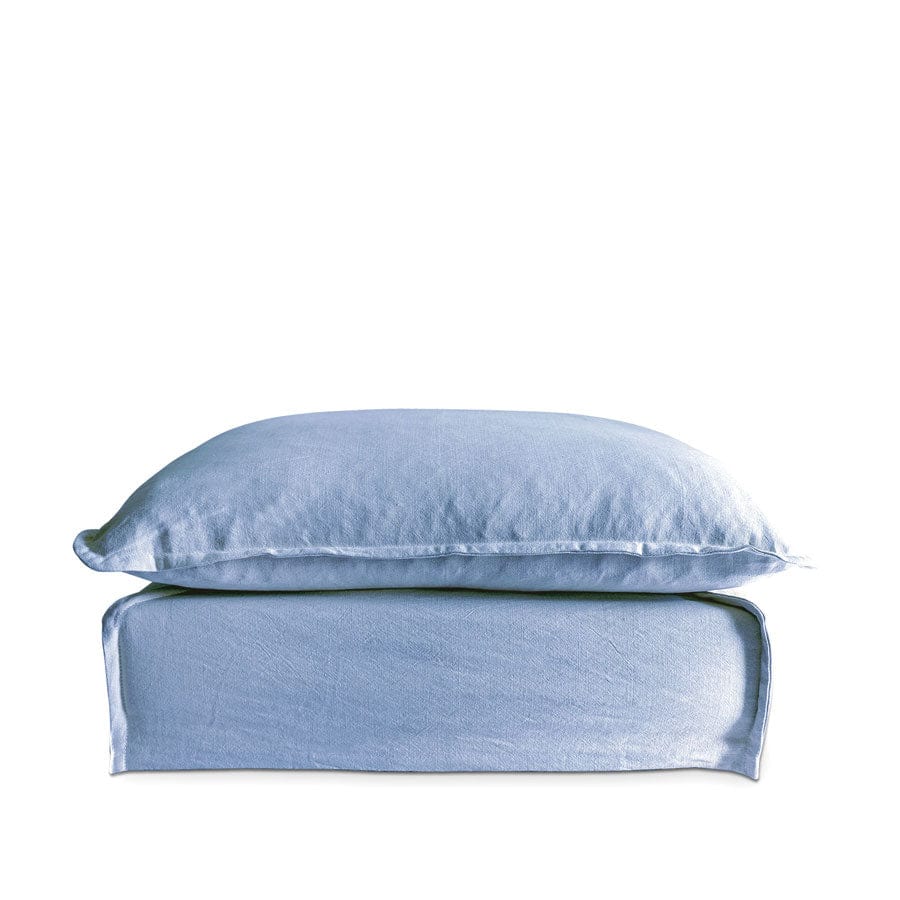 The Cloud Ottoman with Denim Blue Slipcover By Black Mango
