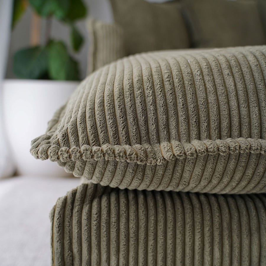 The Cloud Ottoman with Eucalyptus Corduroy Slipcover By Black Mango Interiors