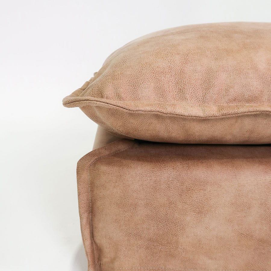 The Cloud Ottoman with Fawn Leatherette Slipcover By Black Mango Interiors