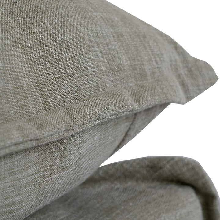The Cloud Ottoman with Olive Slipcover By Black Mango Interiors
