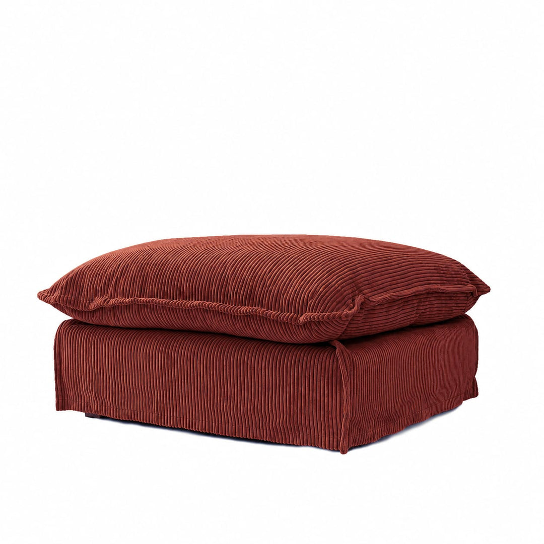 The Cloud Ottoman with Rust Corduroy Slipcover By Black Mango Interiors