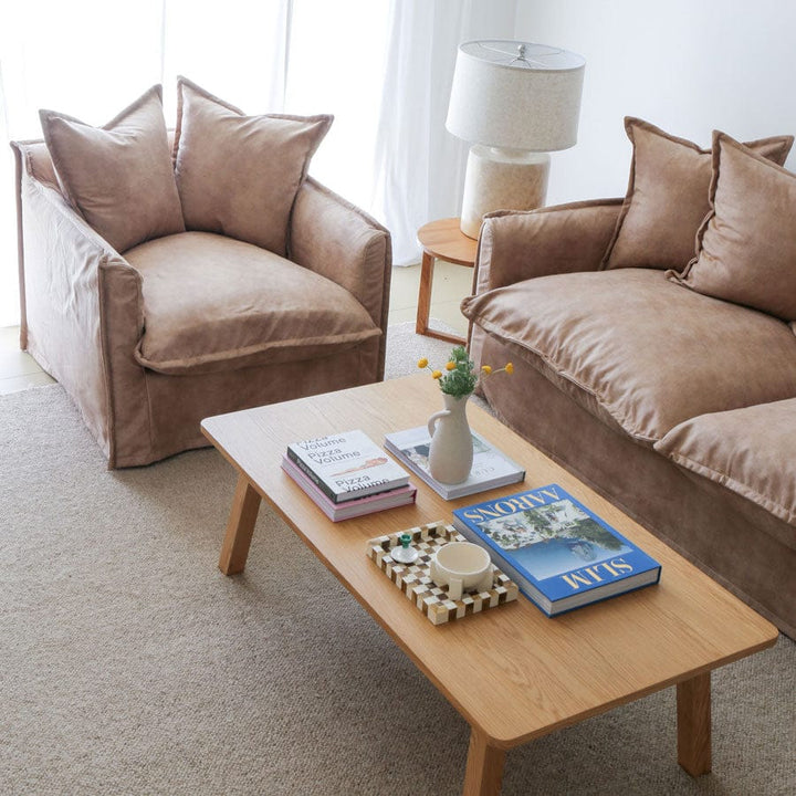 The Cloud Single Seater with Fawn Leatherette Slipcover By Black Mango Interiors