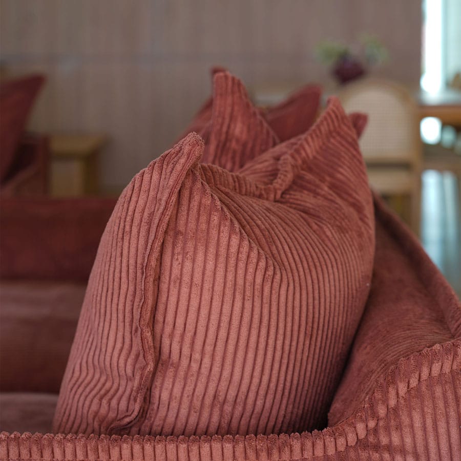 The Cloud Single Seater with Rust Corduroy Slipcover By Black Mango Interiors