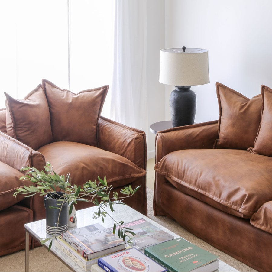 The Cloud Single Seater with Tan Leatherette Slipcover By Black Mango Interiors