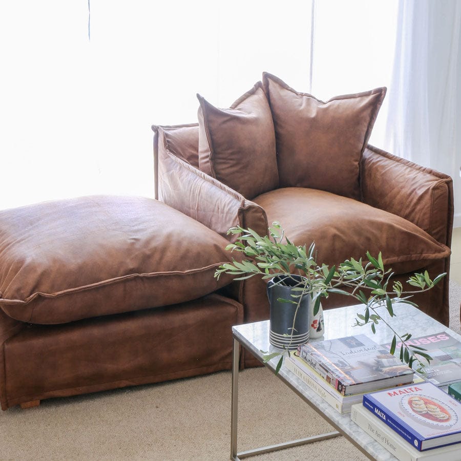 The Cloud Single Seater with Tan Leatherette Slipcover By Black Mango Interiors