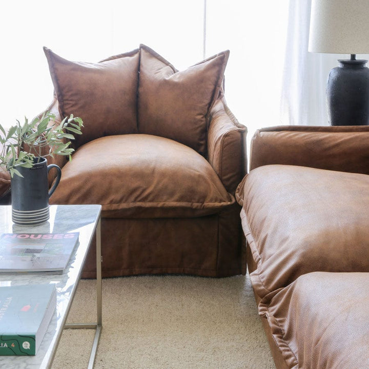 The Cloud Single Seater with Tan Leatherette Slipcover By Black Mango Interiors